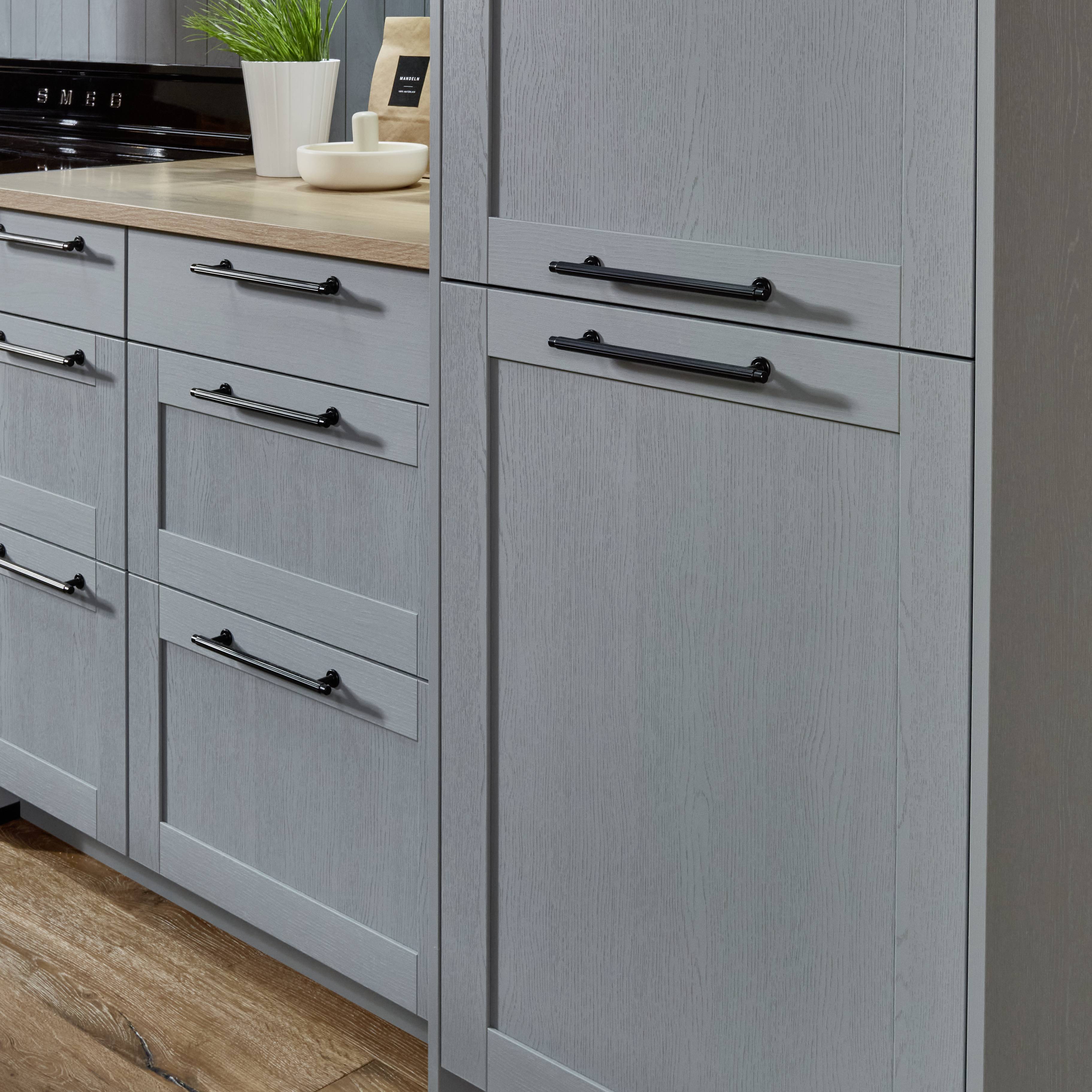 Timeless cabinet colors feel intentional when the undertone, hardware, and surrounding finishes are balanced.