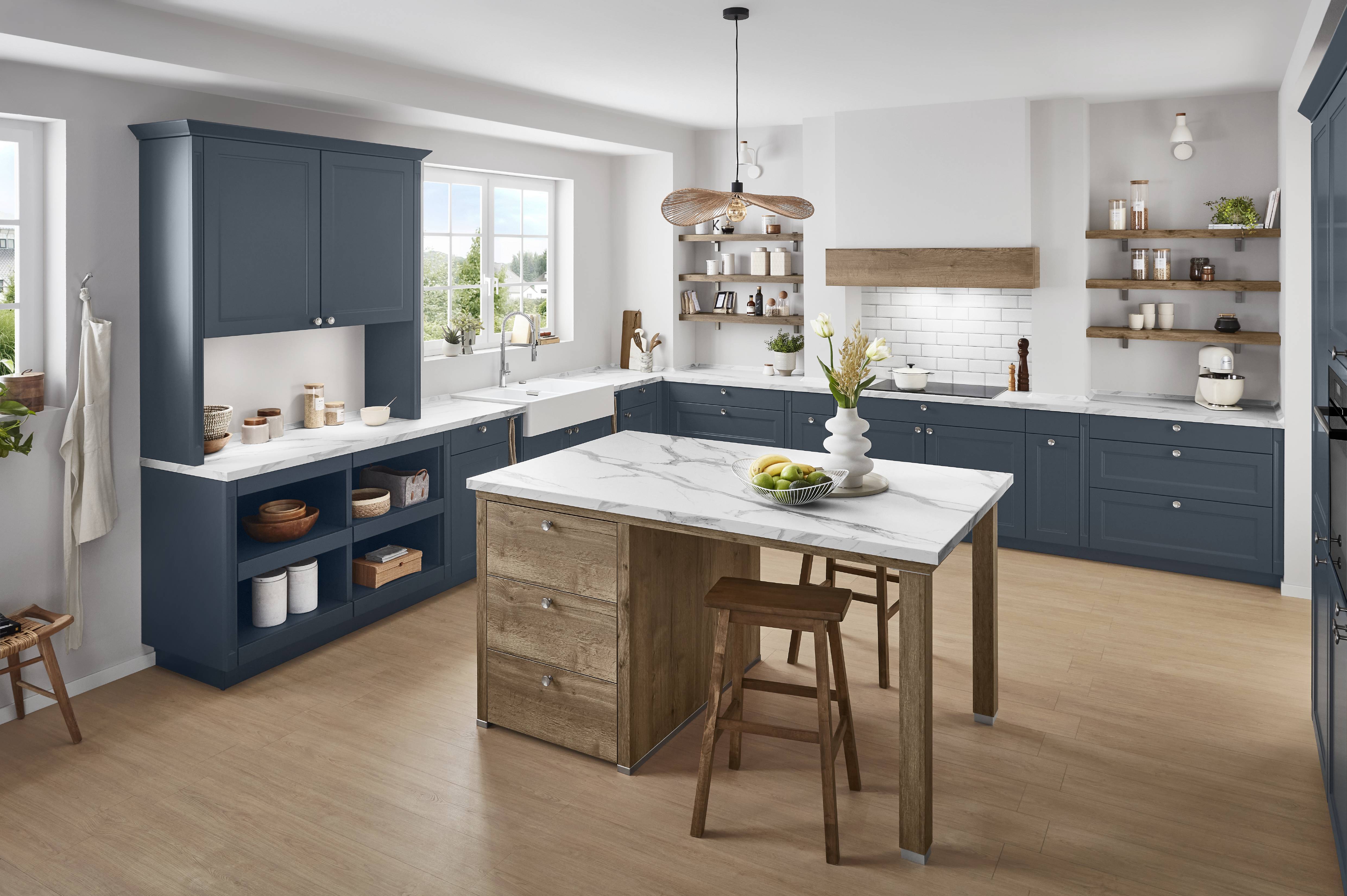 A bright custom kitchen with deep blue cabinetry, warm wood accents, and an inviting island designed for everyday living.