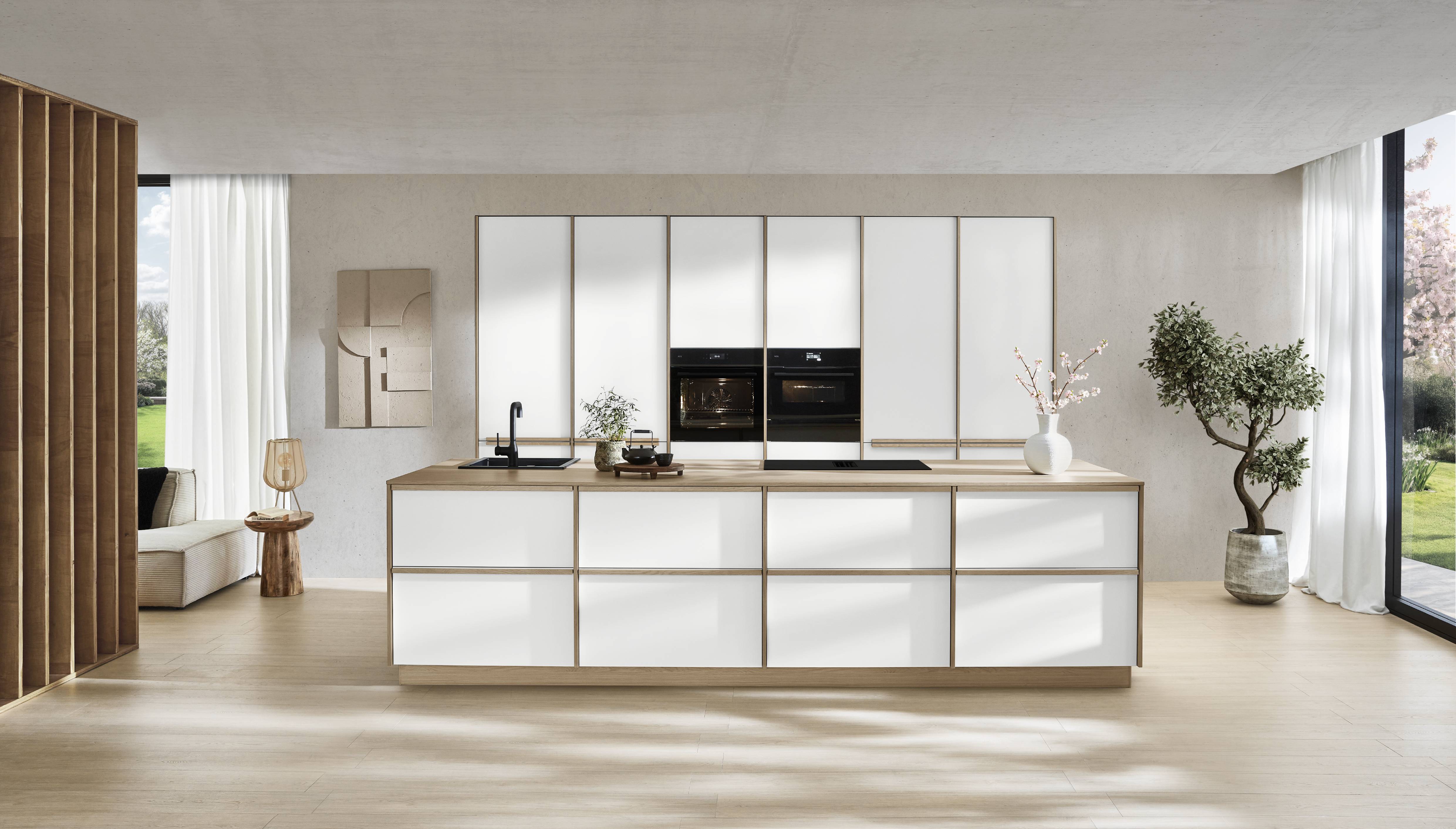 A timeless German kitchen designed with clean lines, refined finishes, and thoughtful functionality—where modern elegance meets effortless everyday living.