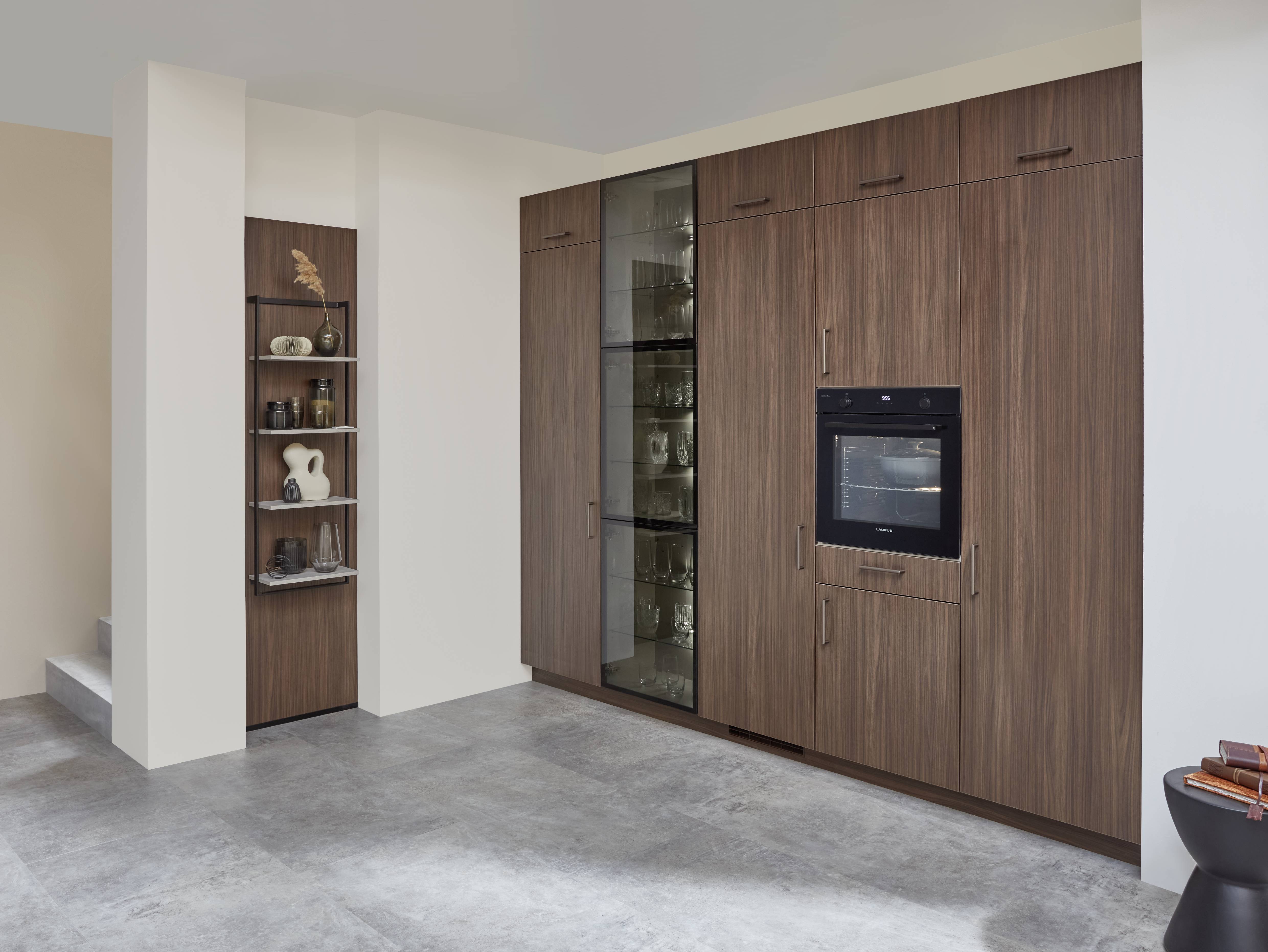 Modern German kitchen featuring rich wood cabinetry, integrated appliances, glass-front storage, and open shelving with a minimalist design.