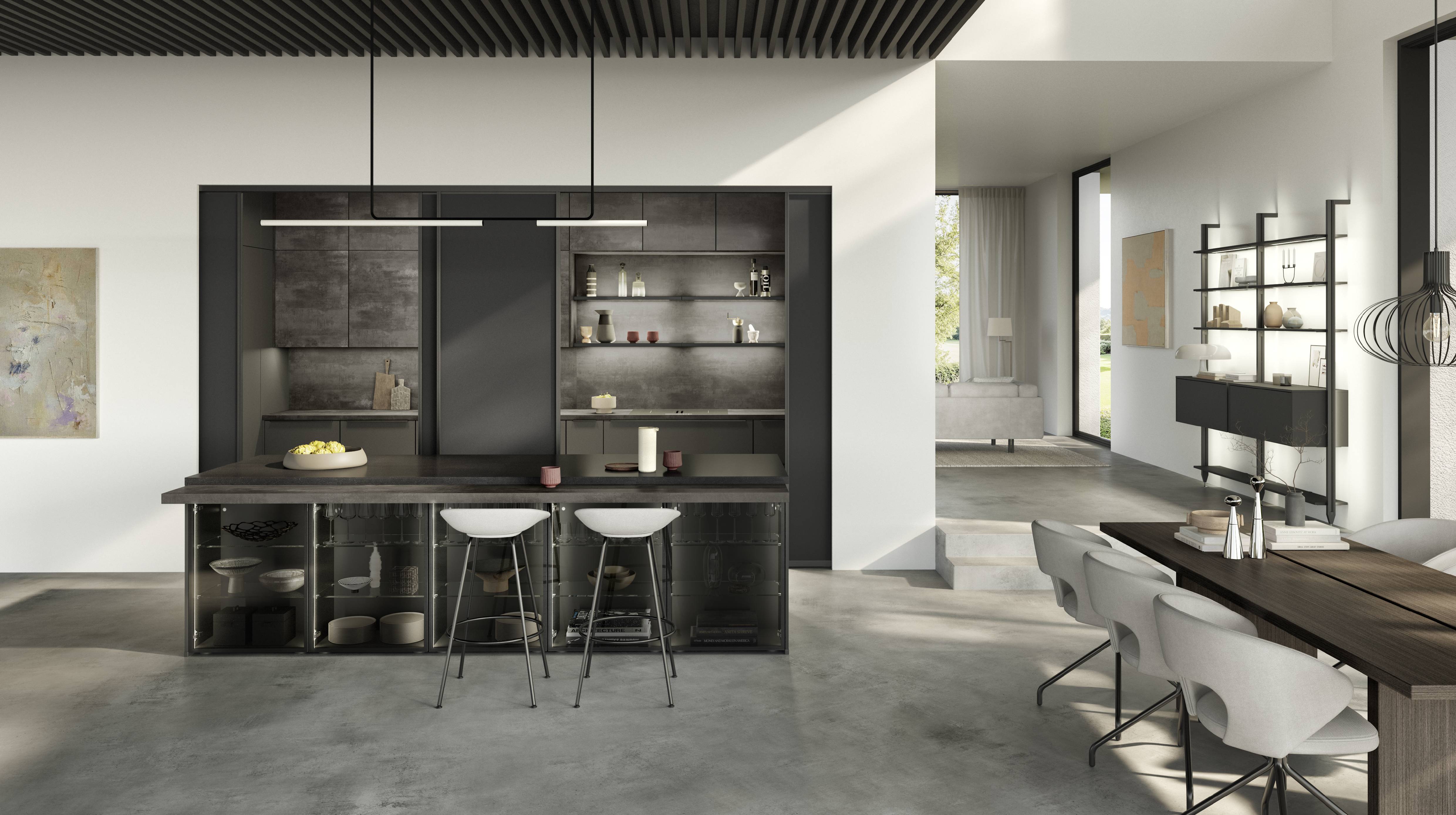 Modern German kitchen with dark matte cabinetry, a spacious island with open glass-front storage, illuminated display shelving, and an open-concept dining area showcasing contemporary minimalist design.