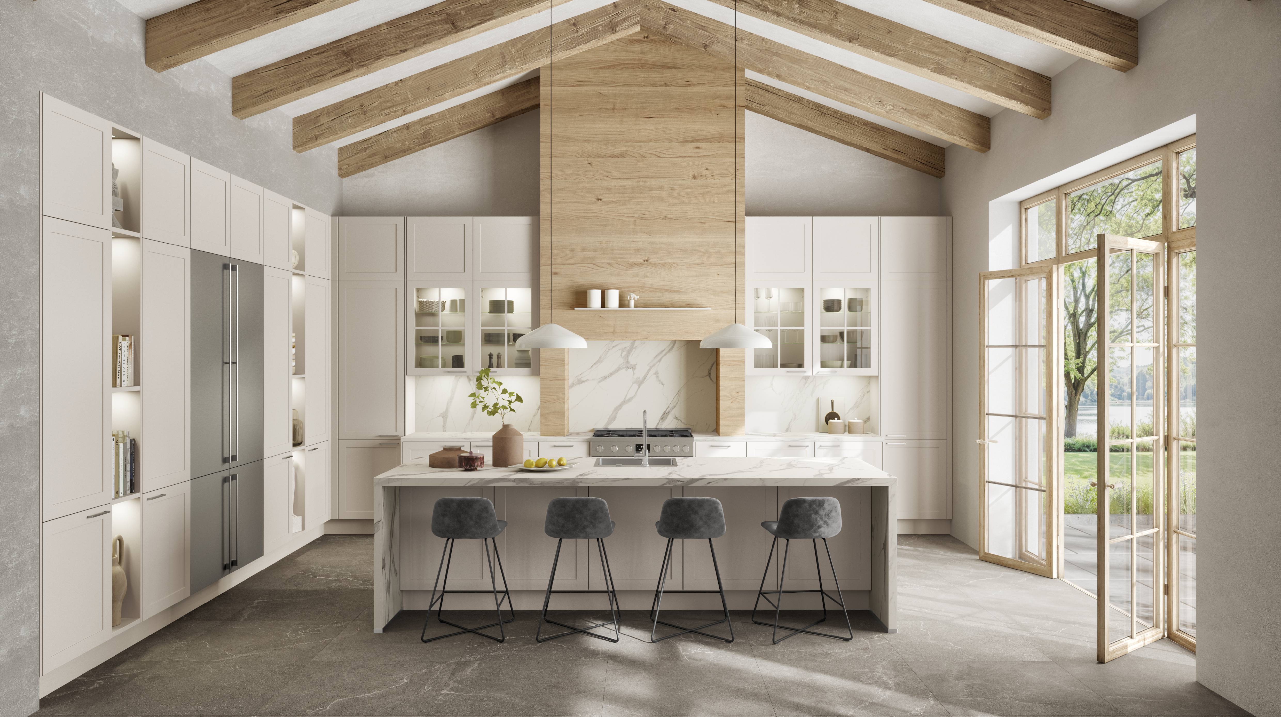 Bright white kitchen with exposed wood ceiling beams, a large island with seating, and tall windows bringing in natural light