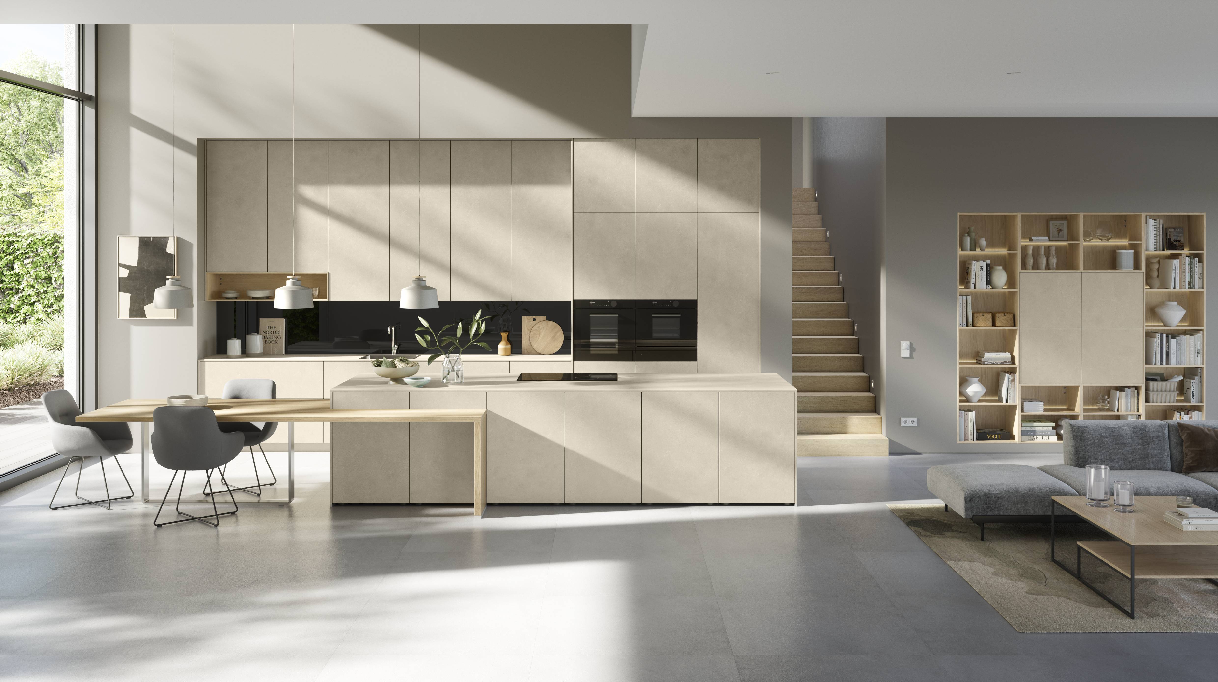 Modern Noblessa USA kitchen featuring a minimalist beige cabinetry design with integrated appliances, a large island, and open-concept layout extending into a dining and living area, highlighted by natural light, clean lines, and warm wood accents.