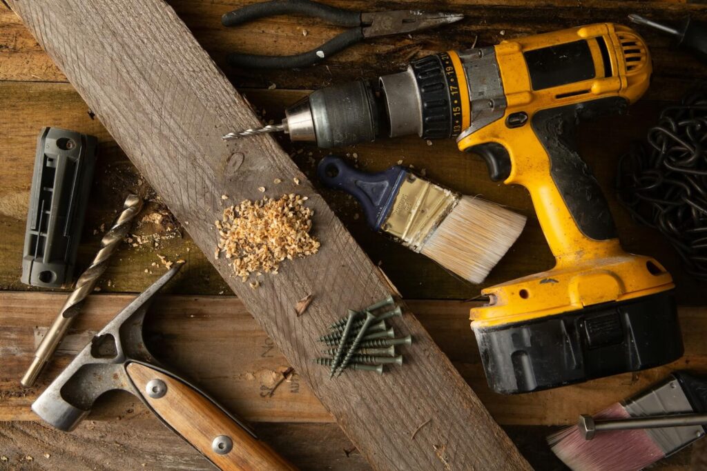Drill and various tools of a remodeler or contractor