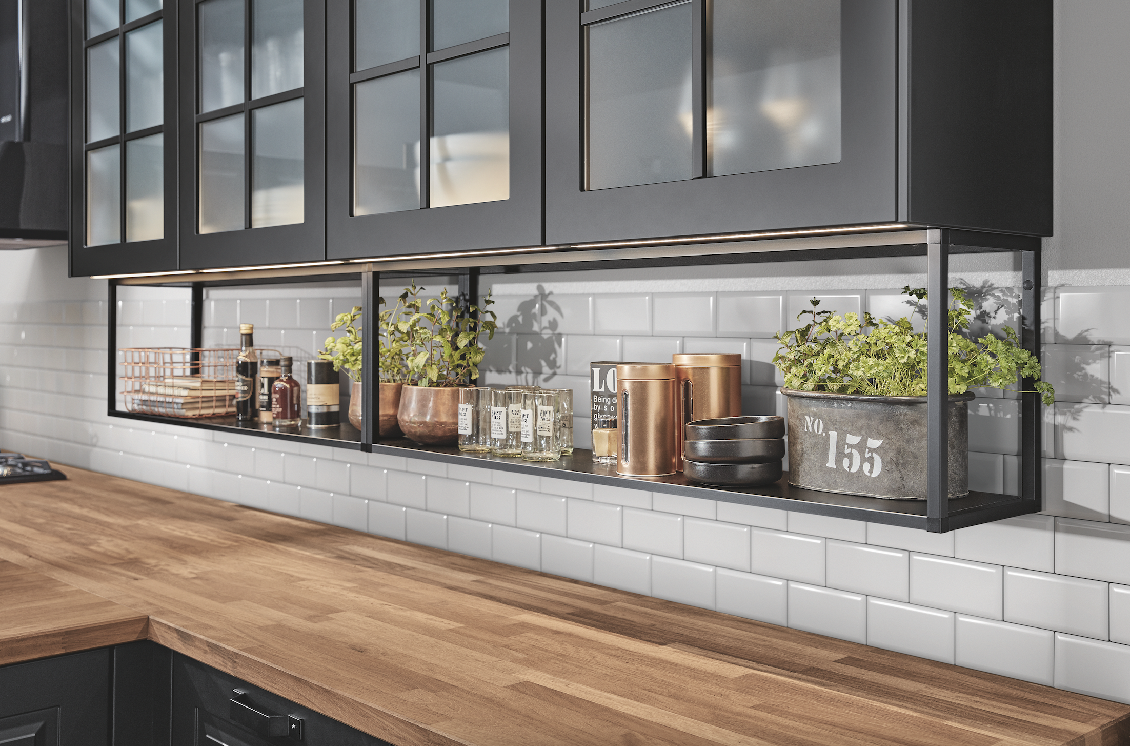 high quality wooden countertop in a noblessa luxury kitchen paired with the Tempo Collection floating storage shelf