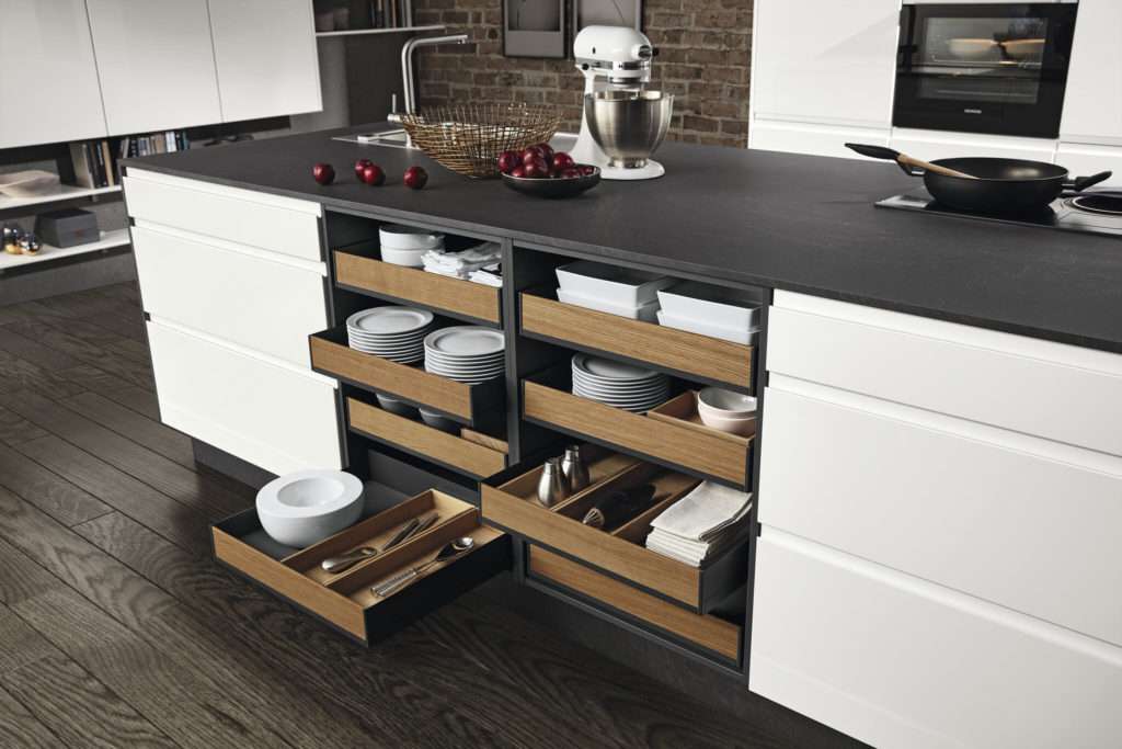 Surf Collection island featuring open front drawer storage and seamless cabinet integration